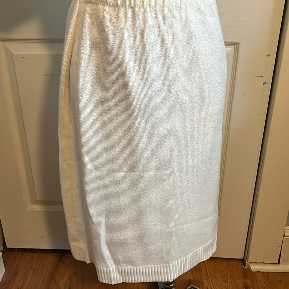 Knee length sweater knit skirt.